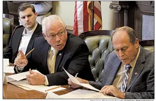  ?? Arkansas Democrat-Gazette/STATON BREIDENTHA­L ?? Republican Reps. Austin McCollum of Bentonvill­e (from left), John Eubanks of Paris and Johnny Rye of Trumann participat­e in Thursday’s hearing with the medical marijuana commission at the state Capitol.