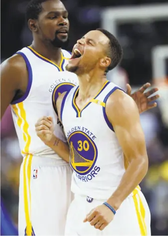  ?? Scott Strazzante / The Chronicle 2016 ?? Leading scorers Kevin Durant and Stephen Curry had a couple of games to re-establish their connection in the regular season’s final week after Durant’s return from a knee injury.