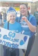  ??  ?? > Corrine Jones with Peter’s sister, Lia, after one of 13 half-marathons