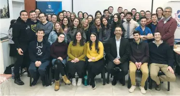  ?? (World Mizrachi) ?? THE WRITER (seated in the front, third from right) meets with gap year students from abroad, at World Mizrachi Headquarte­rs in Jerusalem.