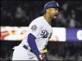  ?? Michael Owen Baker The Associated Press ?? Dodgers Matt Kemp reacts after hitting a three-run homer in the eighth inning against the Diamondbac­ks on Saturday in Los Angeles.