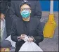  ?? ?? Tam Tak-chi walks to a prison van to head to court.
YouTube blocks account of HK chief candidate