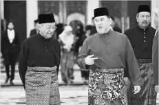  ?? - Bernama photo ?? Yang di-Pertuan Agong Sultan Muhammad V (second, left), with Prime Minister Tun Dr Mahathir Mohamad at the Istana Negara yesterday.