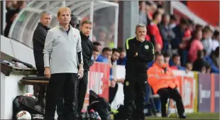  ??  ?? Liam Buckley and Harry Kenny look on during the SSE Airtricity League clash.