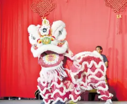  ?? ?? In this file photo, dancers perform the Dragon Dance.