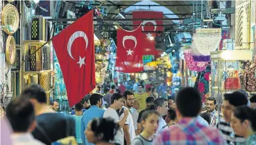  ?? Picture: Getty Images/Kerem Uzel ?? Investors began to dump emerging-market assets amid negative sentiment over Turkey.