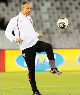  ??  ?? Paul Le Guen controls the ball during a team training session with the Indomitabl­e Lions of Cameroon