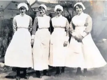  ??  ?? Do you recognise a relative among these four nurses?