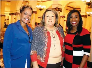  ??  ?? Cherie Abston, Diana Smithson and Martie Hamilton attend the Home for the Holidays Fashion Show by Barbara/Jean Ltd. in November at the Capital Hotel. Hamilton created some fitness challenges to get herself through her time at home.