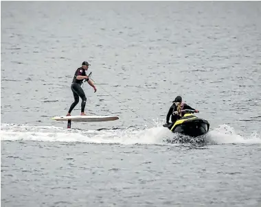  ?? PHOTO: DAVID WALKER/STUFF ?? Balancing on a board was like being a ‘‘kite on the end of a string’’, hydrofoile­r Robert Troeth said.