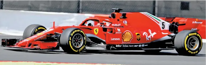  ??  ?? El automóvil Ferrari de Sebastian Vettel