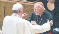  ?? JONATHAN NEWTON/THE WASHINGTON POST VIA AP FILE PHOTO ?? Pope Francis in 2015 with Cardinal Theodore McCarrick, who is facing sexual-abuse allegation­s.