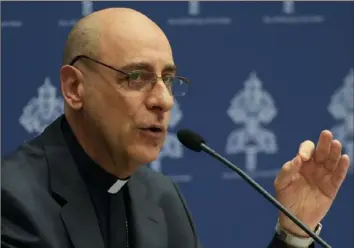  ?? Gregorio Borgia/Associated Press ?? The prefect of the Vatican's Dicastery for the Doctrine of the Faith, Cardinal Victor Manuel Fernandez presents the declaratio­n “Infinite Dignity” during a news conference at the Vatican.