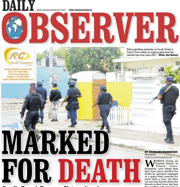  ?? (Photo: Karl Mclarty) ?? Police patrolling yesterday on Fourth Street in Trench Town where an ongoing gang feud has claimed two lives since 2021.