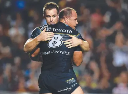  ?? Picture: ZAK SIMMONDS ?? HEALTH SCARE: Me and Matt Scott celebratin­g a try against the Broncos at 1300SMILES Stadium back in 2016. We are all thinking of Thumper after his mini-stroke.
