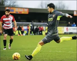  ??  ?? SPOT ON: Mohammed Bettamer nets from the spot for the Swans