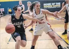  ?? OCAA ?? Niagara's Mary Ingribelli, left, drives to the basket in Ontario women's college basketball bronze medal action versus Mohawk Sunday at Humber College in Etobicoke.