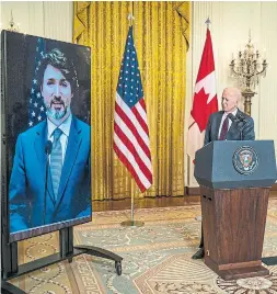  ?? PETE MAROVICH GETTY IMAGES POOL PHOTO ?? U.S. President Joe Biden and Prime Minister Justin Trudeau deliver opening statements via video link in the East Room of the White House on Feb. 23. “The meeting reaffirmed Canada’s position as America’s most loyal vassal,” Thomas Walkom writes.