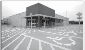  ?? NWA Democrat-Gazette/DAVID GOTTSCHALK ?? The former Walmart Express building in Prairie Grove is being bought by the city to use as a public library.