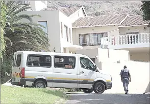  ?? (Pic: TimesLIVE) ?? An officer stands guard outside Speaker Nosiviwe Mapisa-Nqakula’s home in Bruma.