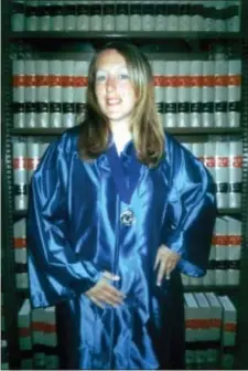  ?? MICHIGAN DEPARTMENT OF CORRECTION­S/ROBYN FRANKEL VIA AP ?? In this circa 2007 photo from the Michigan Department of Correction­s, Jennifer Pruitt celebrates her graduation from a career tech class at the Robert Scott Correction­al Facility in Plymouth, Mich.