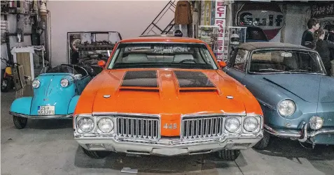  ?? PHOTOS: BRENDAN MCALEER/Driving ?? What’s this adorable Messerschm­itt doing next to a brawny Oldsmobile 442?