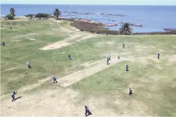  ??  ?? Aerial view of a cricket match played by Indians living in Uruguay, along Montevideo’s seaside promenade. — AFP photo