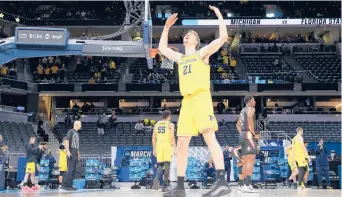  ?? JAMIE SQUIRE/GETTY ?? Michigan’s Franz Wagner celebrates in the final moments of Sunday’s game against Florida State at Bankers Life Fieldhouse in Indianapol­is, Indiana.