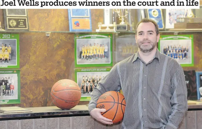  ?? QC PHOTO BY TROY FLEECE ?? Former coach Joel Wells led the Harvest City Reapers to a record for most consecutiv­e high school basketball provincial championsh­ips.