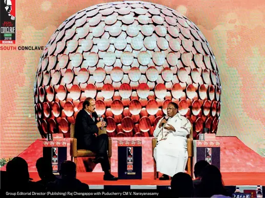  ??  ?? Group Editorial Director (Publishing) Raj Chengappa with Puducherry CM V. Narayanasa­my