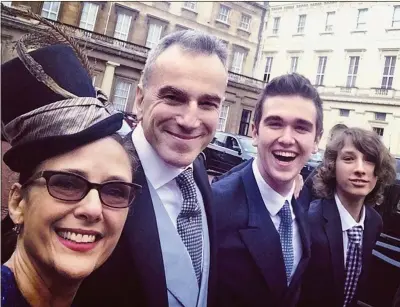  ??  ?? in his element: Daniel Day-Lewis with his wife Rebecca Miller and two of his sons, Gabriel and Ronan