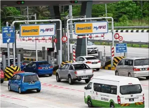  ?? — bernama ?? Faster clearance: rFId lanes at a toll plaza.