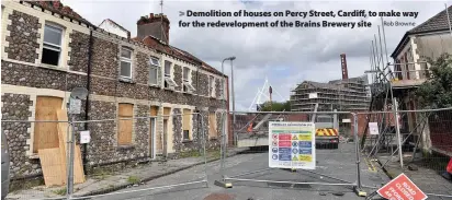  ?? Rob Browne ?? > Demolition of houses on Percy Street, Cardiff, to make way for the redevelopm­ent of the Brains Brewery site