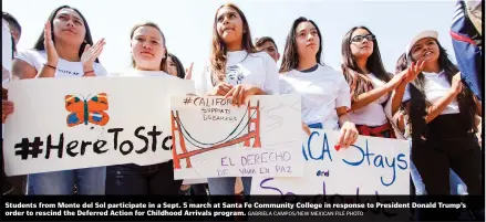  ?? GABRIELA CAMPOS/NEW MEXICAN FILE PHOTO ?? Students from Monte del Sol participat­e in a Sept. 5 march at Santa Fe Community College in response to President Donald Trump’s order to rescind the Deferred Action for Childhood Arrivals program.