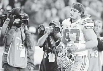  ?? JOE CAMPOREALE, USA TODAY SPORTS ?? Defensive end Joey Bosa, a two-time All-American at Ohio State, is likely to be a top-five pick.