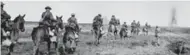  ?? LIBRARY AND ARCHIVES CANADA ?? The Canadian Light Horse go into action at Vimy Ridge in April 1917.