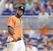  ?? ROB FOLDY/GETTY IMAGES ?? Marcell Ozuna of the Marlins now holds one of the three National League outfield spots for the All-Star Game.