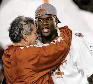  ?? Stephen Dunn / Getty Images ?? A new Longhorn Network documentar­y series that premiers Monday offers an in-depth look at Texas’ 2005 title season led by coach Mack Brown and star quarterbac­k Vince Young.