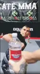  ??  ?? Undefeated Israeli Mixed Martial Arts fighter Natan Levy, who now lives in Las Vegas, delivered a kick so powerful that he sent the bottle flying upon colleagues training next to him.