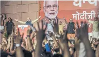  ?? ATUL LOKE GETTY IMAGES ?? Indian Prime Minister Narendra Modi’s Bharatiya Janata Party is set for another five-year term on Thursday after a huge victory.