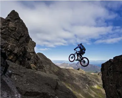  ??  ?? Summit else: Danny MacAskill mountain biking in Skye – but there are many less hair-raising routes