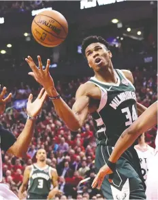  ?? THE CANADIAN PRESS/FRaNK GUNN ?? Bucks star Giannis Antetokoun­mpo’s playoff numbers are down compared with his regular-season output.