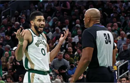  ?? STAFF PHOTO — STUART CAHILL/BOSTON HERALD ?? Boston Celtics forward Jayson Tatum complains to referee Kevin Cutler during Friday’s 102-100 loss to the Denver Nuggets in Boston.