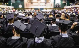  ?? JOE BUGLEWICZ / THE NEW YORK TIMES ?? Students graduate at Motlow State Community College in Tullahoma, Tenn. New data suggest that some community colleges are doing a much better job of preparing students for future success.