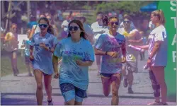  ?? COURTESY OF CARLY SPROSS ?? unners in last year’s Hope For Hallie Color Run/Walk, held in loving memory of Hallie Jackson, raised funds for mental health awareness. Registrati­on is still open for this year’s race on Saturday, April 27, to be held in Swarthmore.