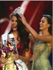  ??  ?? „ The Philippine­s’ Catriona Gray is crowned Miss Universe.