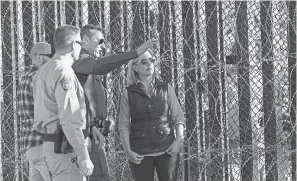  ?? NICK OZA/FOR USA TODAY ?? Homeland Security Secretary Kirstjen Nielsen toured the border in San Diego with Chief Patrol Agent Rodney S. Scott on Nov. 20.