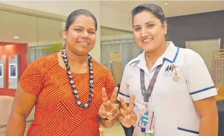  ?? Picture: REINAL CHAND ?? Dr Rachel Devi (left) with frontline nurse and vaccine recipient Pratika Singh at the start of the COVID-19 frontliner­s vaccinatio­n campaign at Nadi Internatio­nal Airport earlier this year.