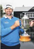  ?? PHOTO: PHOTOSPORT ?? Michael Hendry celebrates his New Zealand Open victory in 2017.