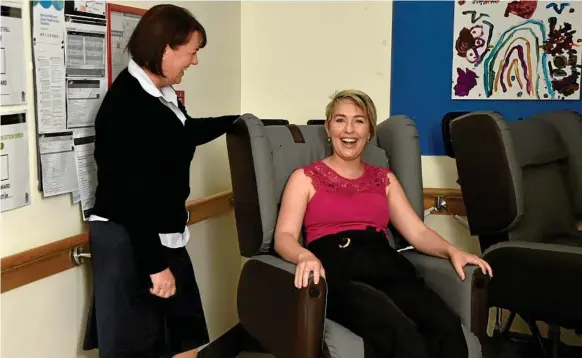  ?? Bev Lacey Photo: ?? CANCER DONATION: Checking out the new chairs in the Toowoomba Hospital Cancer Centre are nurse unit manager ward 6D Andrea Barber (left) and donor Venessa Cronin.